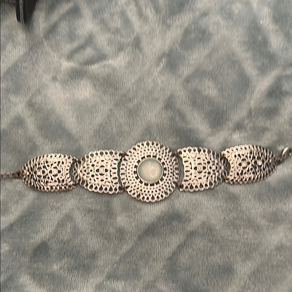Intricate Silver Filigree Bracelet with Vintage Charm